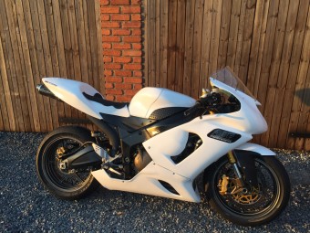 Kawasaki ZX636 2005-2005<p>A16 Underseat Carbon Race Exhaust with Polished Slashcut Outlet</p><br>