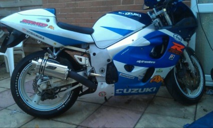 Suzuki GSXR SRAD 1996-1999<p>A16 Stubby Carbon Exhaust with Polished Slashcut Outlet</p><br/>